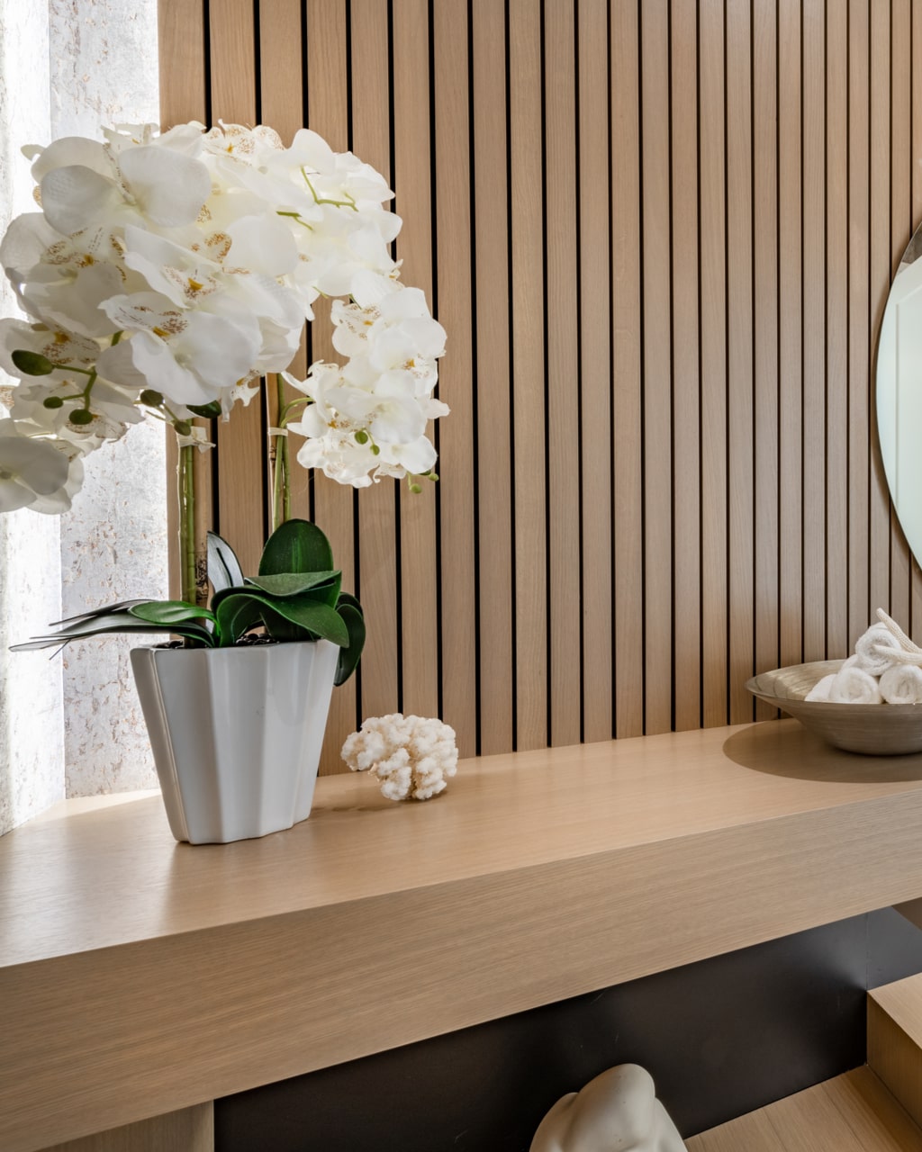 Room with slatted wood walls orchid square sink